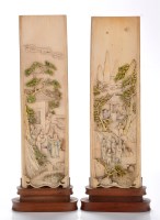 Lot 740 - Two Chinese carved ivory wrist rests, under...