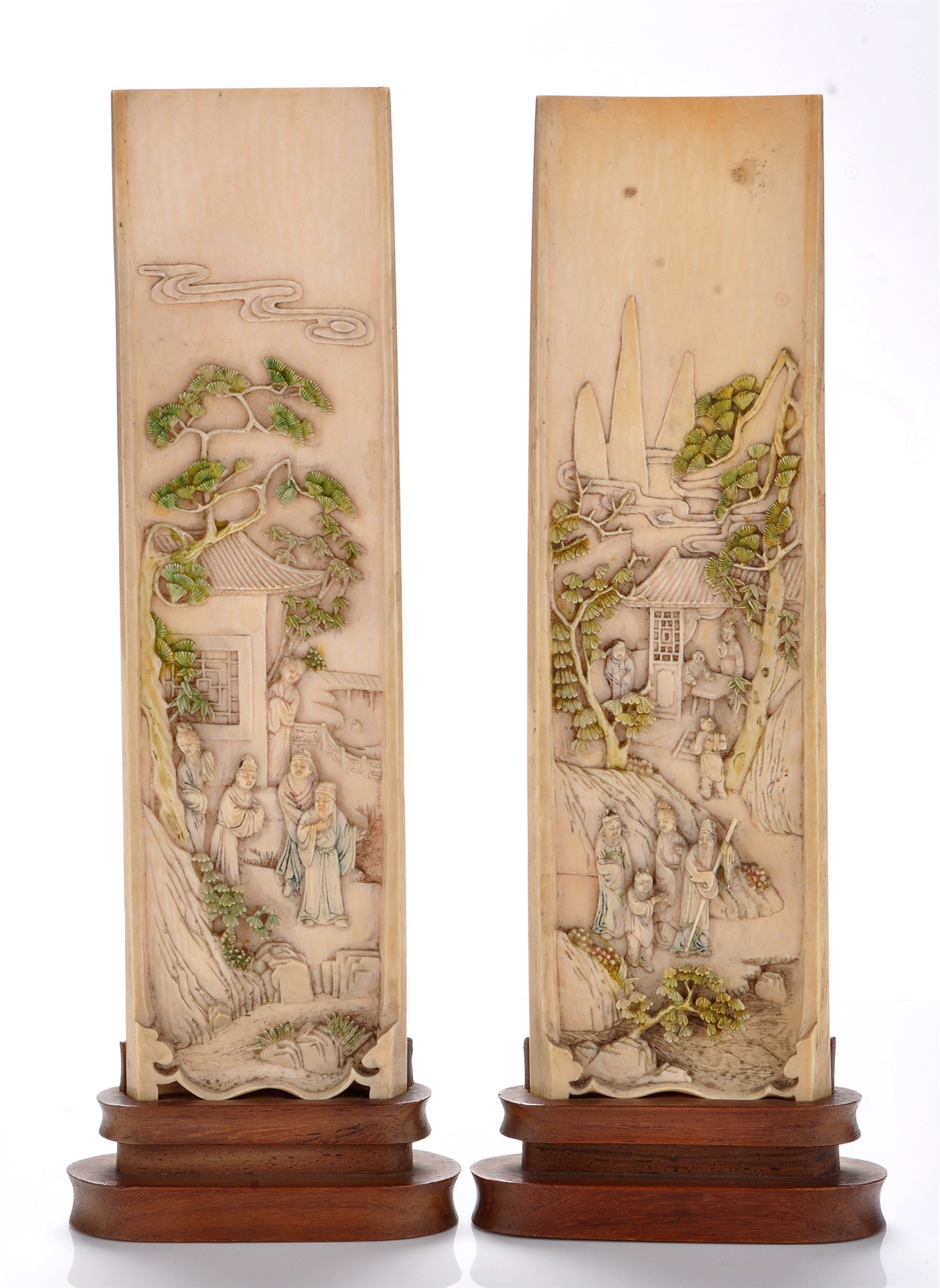Lot 740 Two Chinese carved ivory wrist rests, under