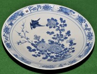 Lot 762 - Japanese blue and white dish, the centre with...