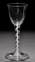 Lot 780 - A colour twist wine glass, the round funnel...