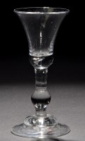 Lot 794 - A baluster wine glass, the bell bowl with a...