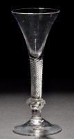 Lot 809 - A composite stem wine glass, the trumpet bowl...