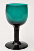 Lot 812 - A green wine glass, the ovoid bowl raised on a...