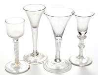 Lot 814 - *Two drawn trumpet wine glasses, with short...