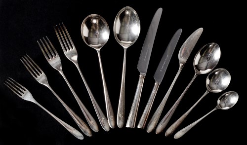 Lot 1041 - An Elizabeth II flatware and cutlery service,...