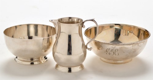 Lot 1048 - An Elizabeth II cream jug and matching sugar...