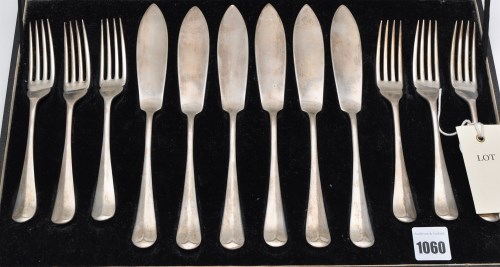 Lot 1060 - Six George V fish knives and six matching...
