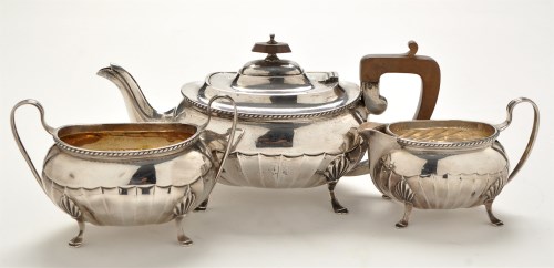 Lot 1081 - A George V three piece tea service, by Cooper...
