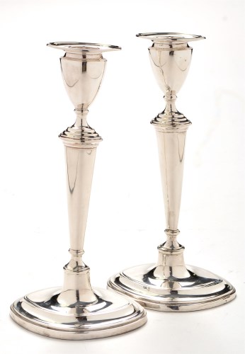 Lot 1116 - A pair of Edwardian candlesticks, by Thomas A....