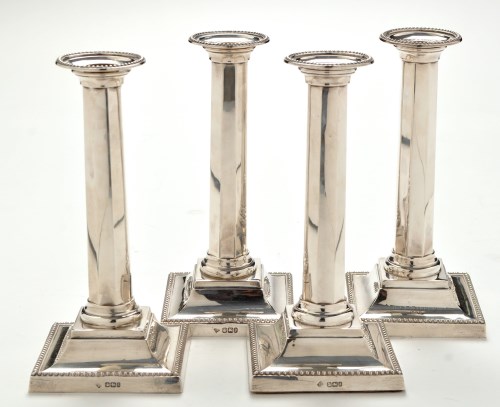 Lot 1120 - A set of four Victorian candlesticks, by...