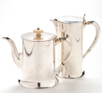 Lot 1139 - A George V teapot and matching hot water jug,...