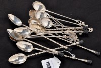 Lot 1162 - Ten Indian white metal spoons, with long stems...