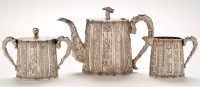 Lot 1171 - A Chinese silver three piece tea service, by...