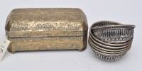 Lot 1173A - Six embossed white metal bowls, possibly...