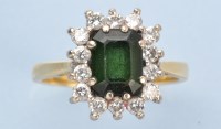 Lot 1193 - A tourmaline and diamond cluster ring, the...