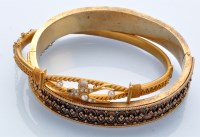 Lot 1198 - A Victorian yellow metal etruscan style bangle,...
