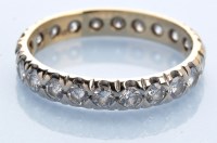Lot 1204 - A diamond eternity ring, set with twenty two...