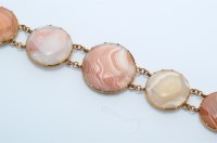 Lot 1213 - A Victorian banded agate bracelet, set with...