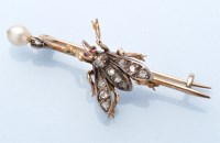 Lot 1216 - An 19th Century diamond, ruby and pearl set...