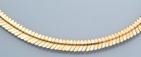 Lot 1234 - A 14ct. yellow, white and rose gold necklace,...
