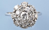 Lot 1240 - A diamond cluster ring, the brilliant-cut...