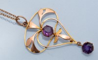 Lot 1255 - An Edwardian Art Nouveau pendant, yellow metal...
