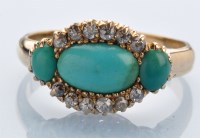 Lot 1257 - A turquoise and diamond ring, set with three...