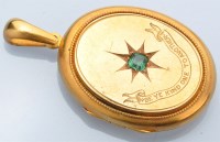 Lot 1259 - A Victorian yellow metal locket pendant, set...