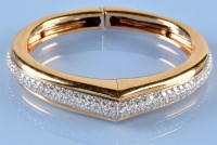 Lot 1267 - A diamond set limited edition Cartier bangle,...
