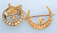 Lot 1283 - Two 19th Century crescent brooches, one set...