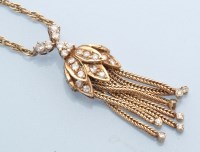 Lot 1290 - A diamond tassel pendant necklace, the tassel...