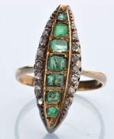 Lot 1293 - An emerald and diamond ring, the facet-cut...