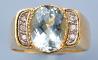 Lot 1304 - An aquamarine and diamond ring, the oval facet-...