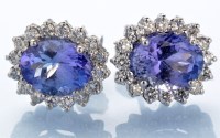 Lot 1309 - A pair tanzanite and diamond cluster earrings,...