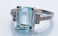 Lot 1315 - An aquamarine and diamond ring, the...