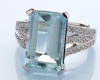 Lot 1317 - An aquamarine and diamond ring, the...