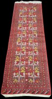 Lot 1333 - An Afghan runner, decorated in reds and whites...