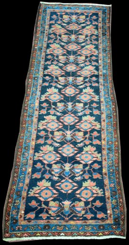 Lot 1339 - A Tafreash runner, the blue ground decorated...