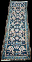 Lot 1339 - A Tafreash runner, the blue ground decorated...