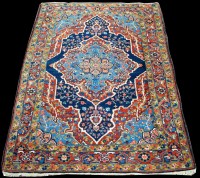 Lot 1341 - A Tabriz rug, the central floral medallion...