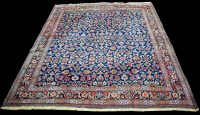 Lot 1345 - A Mashad carpet, the blue ground under...