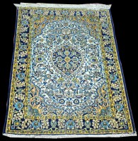 Lot 1347 - A Qum rug, the central lozenge shaped...