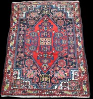 Lot 1352 - A Tafresh rug, the lozenge shaped central...