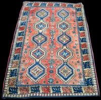 Lot 1354 - A Yalameh rug, the red field under two rows of...