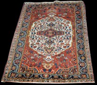 Lot 1355 - A Bakhtiari rug, the lozenge shaped white...