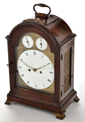 Lot 1385 - A George III style mahogany cased mantel clock,...