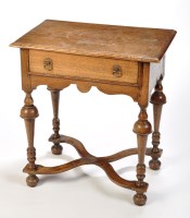 Lot 1397 - An early 18th Century style oak lowboy, the...