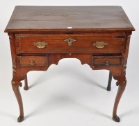 Lot 1435 - An 18th Century elm lowboy, the rectangular...