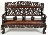 Lot 1440 - A late 19th Century Chinese carved hardwood...