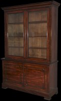 Lot 1447 - A late 19th Century mahogany bookcase, with a...